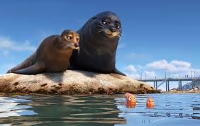 An animated scene from the Pixar film "Finding Dory." Two sea lions on a rock talking to two small clownfish.