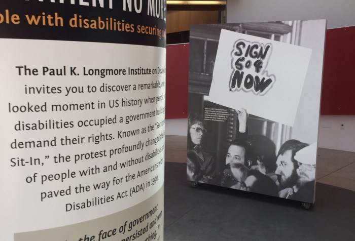Two posters, on the left is a poster that says, "Patient No More" and then smaller text describing the exhibit. On the right is a black and white photo of people crowded in front of a building with one sign that says: "Sign 504 now"
