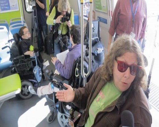Photos of various people in wheelchairs inside the center of a train car.