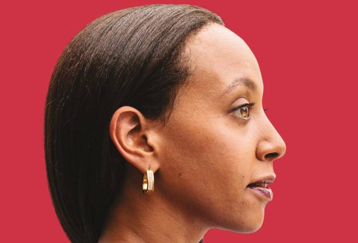 The book cover shows Haben in profile, confidently facing forward in a blue dress. The background is a warm red, and white text over the bottom half reads: “Haben"