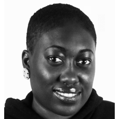 Imade Nibokun, a Black woman with short hair smiling
