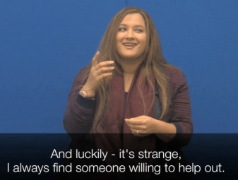 A South Asian woman using sign language. Below is a caption: "And luckily, it's strange, I always find someone willing to help out.'